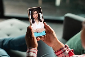 Patient attending a telepsychiatry session through video call from home