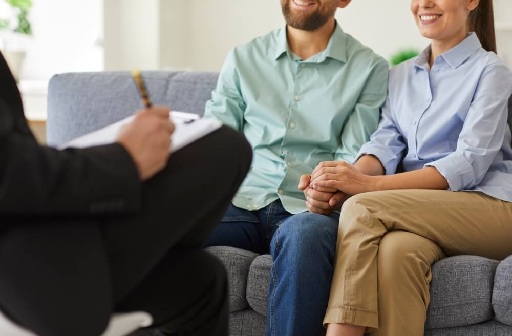 Psychiatrist consulting patient during mental health evaluation for schizoaffective disorder diagnosis