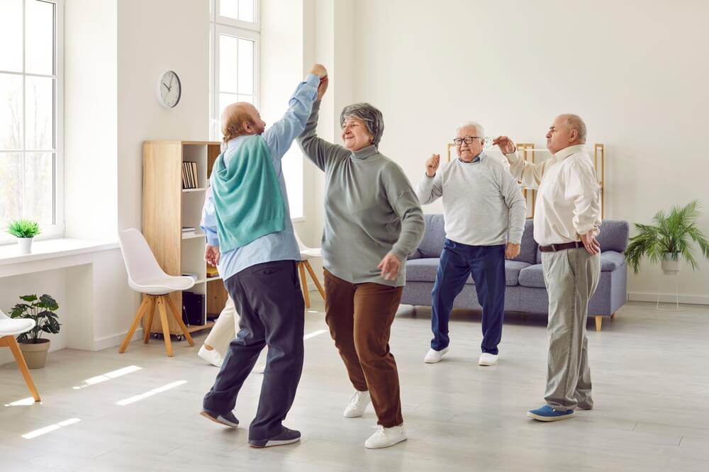 Senior adults dancing as part of lifestyle support for dementia management