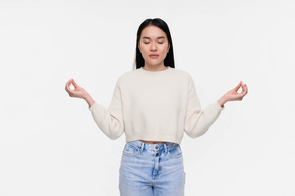 person working out outdoors to reduce anxiety and manage PTSD symptoms