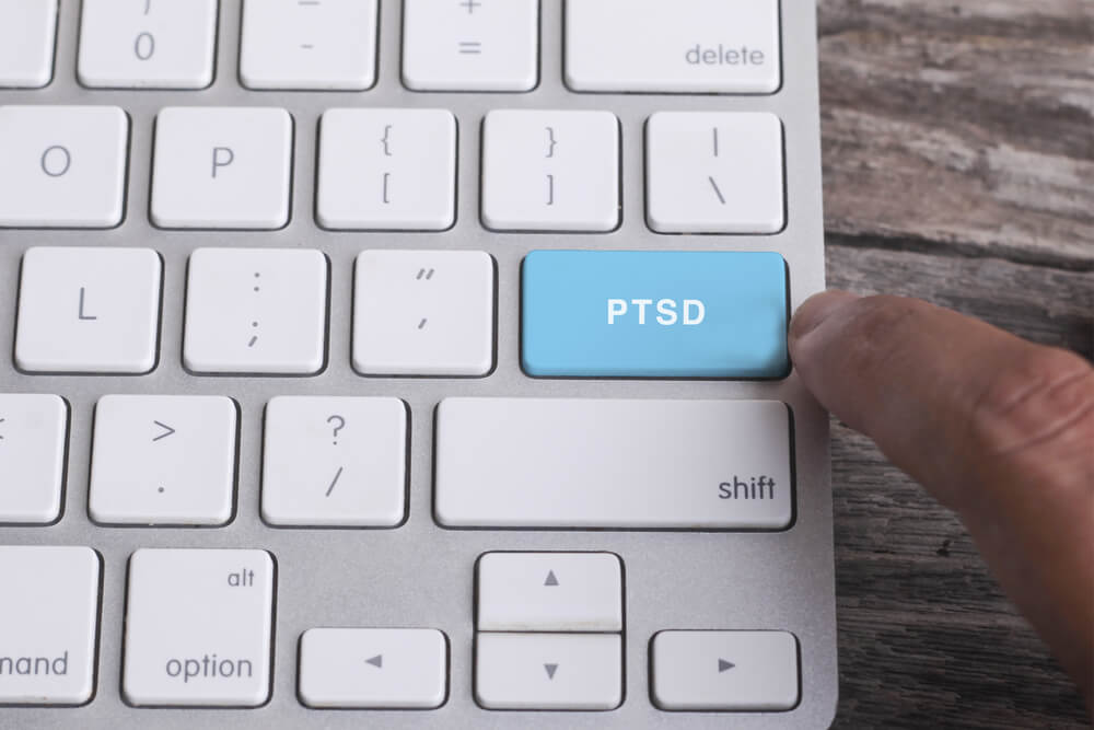 ptsd psychiatrist explains PTSD medication treatment options to patient