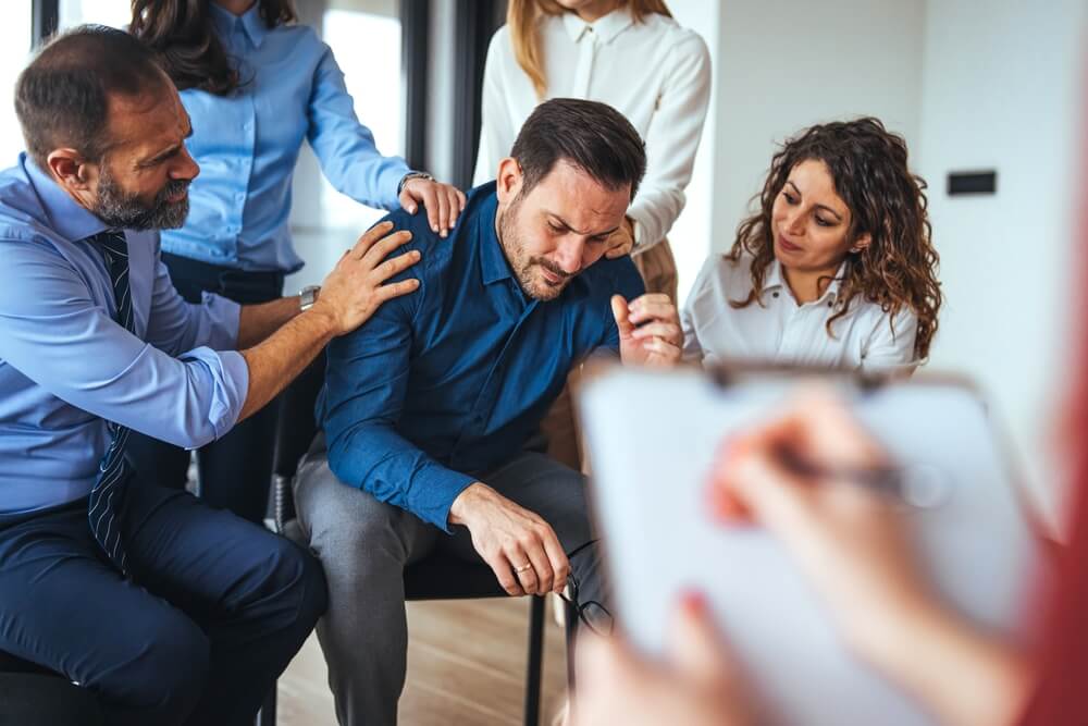 Mental health awareness concept with person reflecting emotional stress and support