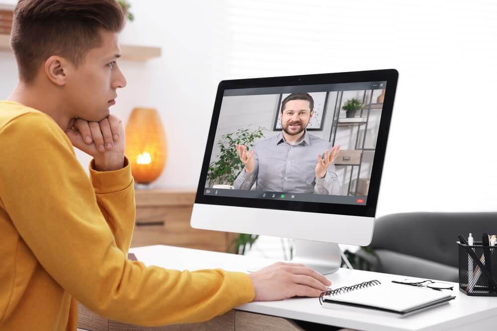 Patient attending online psychiatry session through telepsychiatry services in Florida