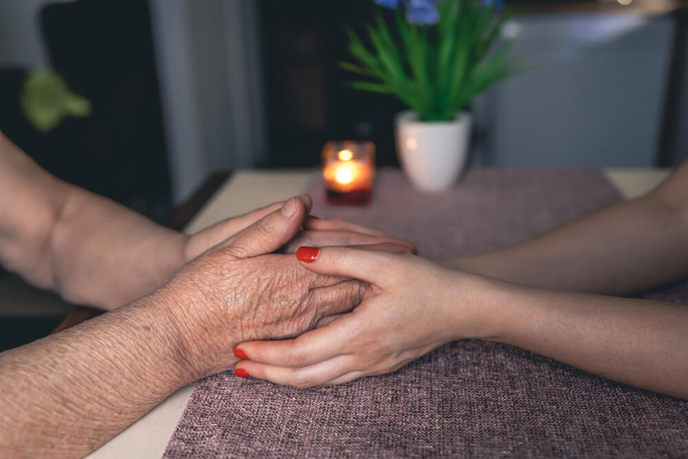 Older adult in therapy session with psychologist, showing counseling for depression treatment