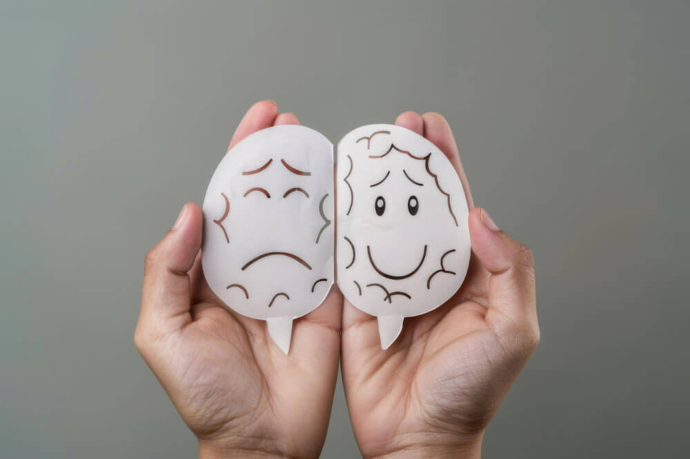 Person experiencing emotional mood swings representing cyclothymic disorder or mild bipolar disorder