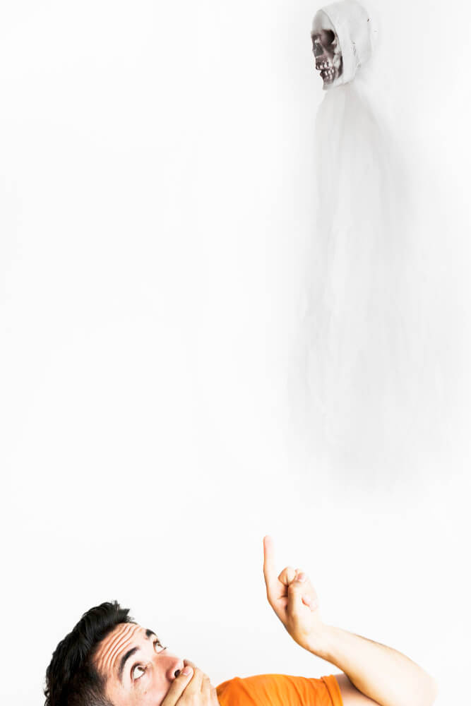 individual showing fear response when encountering a shadow representing fear and phobia