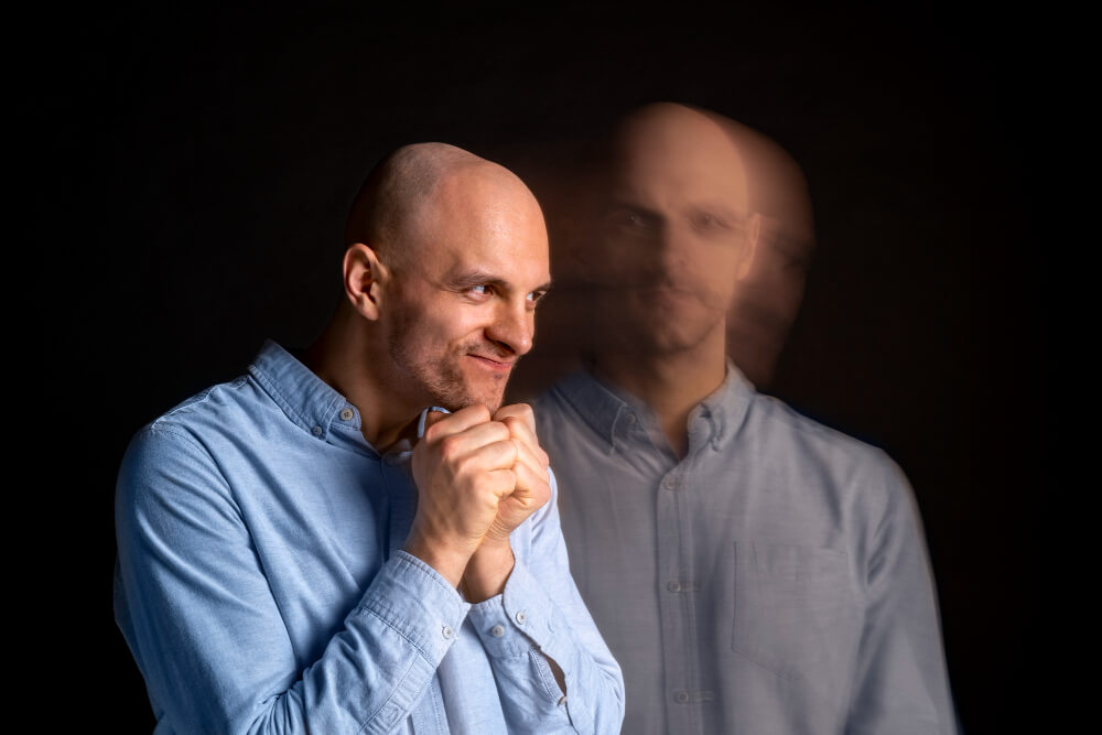 Man experiencing emotional highs and lows representing bipolar disorder in men