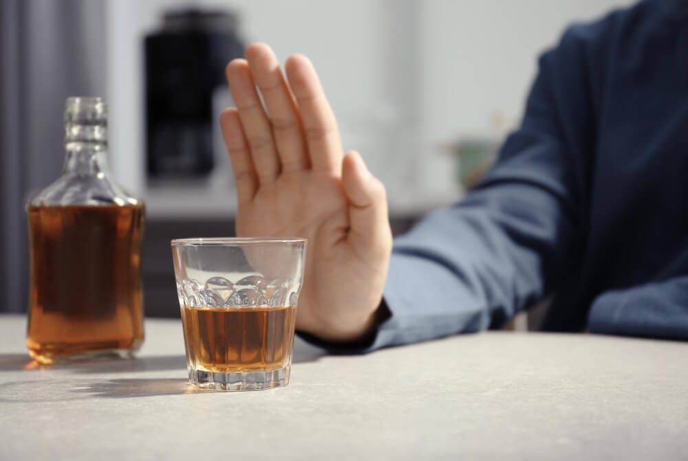 Hopeful scene showing recovery from alcohol addiction with control, support, counseling, and improved mental health.